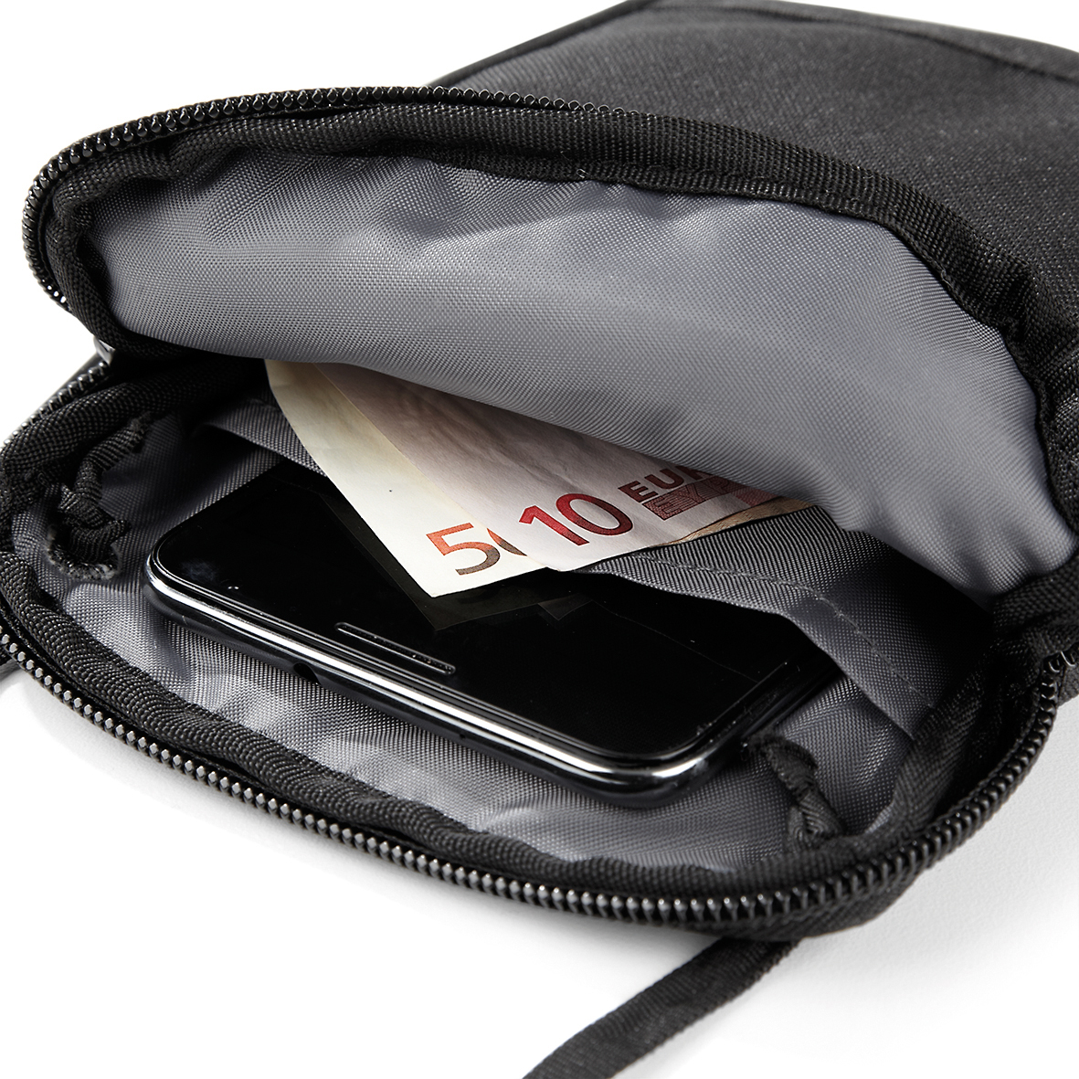 Handytasche Travel Wallet in der Farbe Schwarz Detailansicht des gepolstertem Hauptfach günstig bedruckt bei taschenprint.de