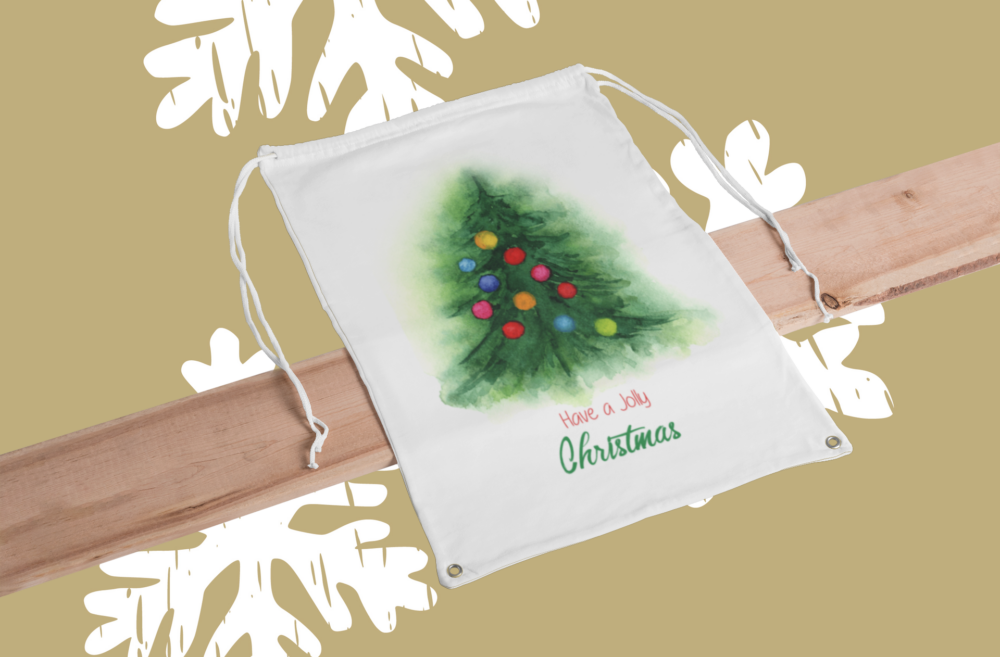 Baumwollsäckchen Tannenbaum Jolly Christmas Geschenkbeutel naturfarben mit bunten Tannen-Motiv